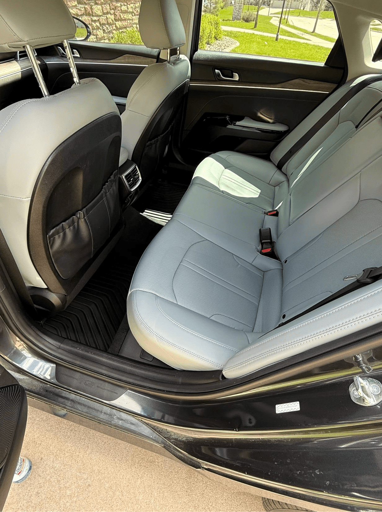 Clean rear seats and floor mats after a full mobile detail in Olathe, KS